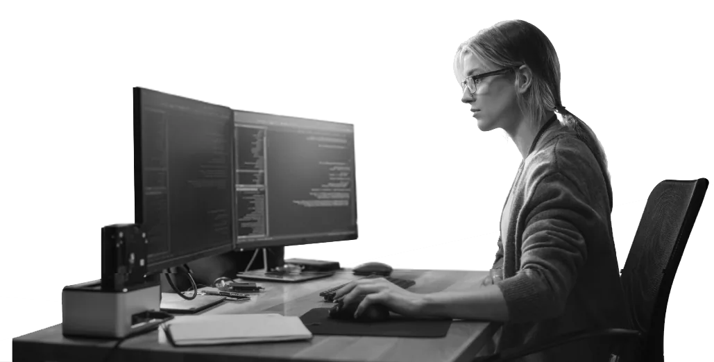 Security analyst monitoring endpoint alerts across multiple screens