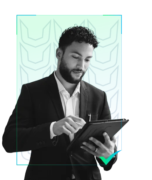 Managed IT engineer checking system status on a tablet